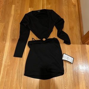 Black dress originally 60. Never worn still has tags.